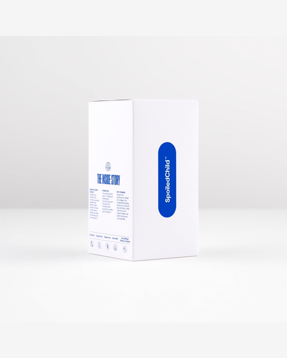 A product shot of the white outer packaging box for SpoiledChild B40 supplements. The box features minimalist blue branding and text, shown from a slight angle against a plain white background.