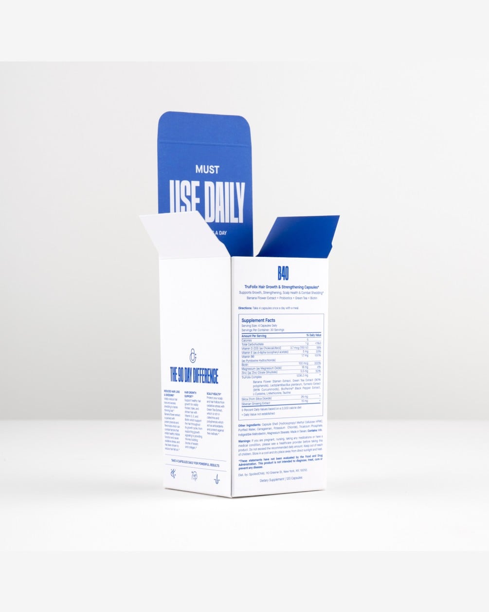 A product shot of the white outer packaging box for SpoiledChild B40 supplements. The box is shown open at the top, revealing a blue interior flap with the text 