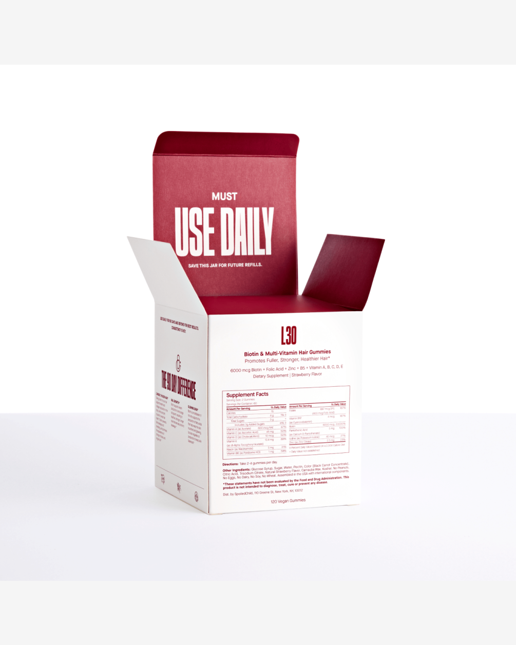 A white product box for SpoiledChild L30 Biotin & Multi-Vitamin Hair Gummies is shown open. The inside flap features the words 
